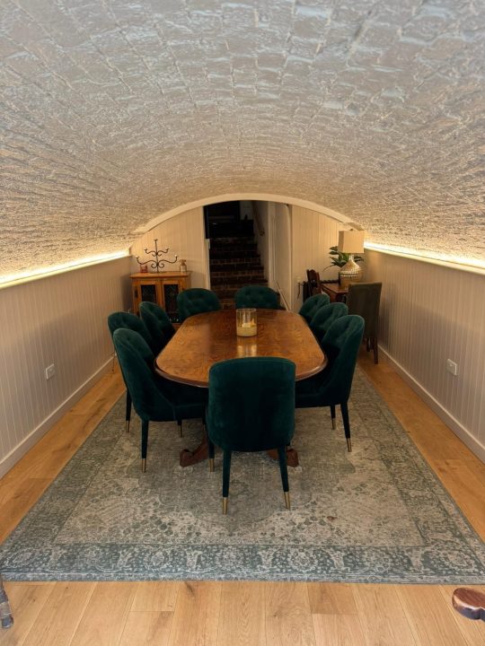 Vaulted brick cellar converted into a dining room